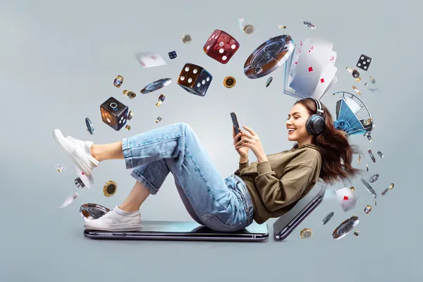A woman smiling by bright slot machines showing lucky symbols, showcasing the exciting slot offerings at TKPKK.